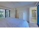 Bedroom with access to bathroom and courtyard at 201 Woodland Dr # 201, Osprey, FL 34229