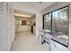 Kitchen with breakfast nook and sliding glass doors to patio at 201 Woodland Dr # 201, Osprey, FL 34229