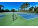 Community tennis and pickle ball courts at 201 Woodland Dr # 201, Osprey, FL 34229