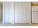 Two large storage closets with louvered doors at 201 Woodland Dr # 201, Osprey, FL 34229