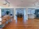 Spacious common area with comfortable seating and a large dining table at 201 Woodland Dr # 201, Osprey, FL 34229