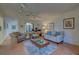 Comfortable living room featuring a sofa and two armchairs at 201 Woodland Dr # 201, Osprey, FL 34229
