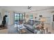 Spacious living area with open floor plan and water view at 10780 Tarflower Dr # 102, Venice, FL 34293
