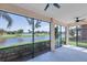 Spacious screened patio overlooking a peaceful lake at 10780 Tarflower Dr # 102, Venice, FL 34293
