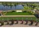 Brick pathway under pergola leading to clubhouse at 10780 Tarflower Dr # 102, Venice, FL 34293