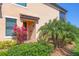 Attractive front door with landscaping at 10780 Tarflower Dr # 102, Venice, FL 34293