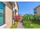 Brick walkway to the entrance of home at 10780 Tarflower Dr # 102, Venice, FL 34293