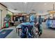 Golf shop with clothing, equipment, and a seating area at 10780 Tarflower Dr # 102, Venice, FL 34293