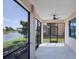 Spacious screened porch overlooking a peaceful lake at 10780 Tarflower Dr # 102, Venice, FL 34293