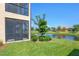 Lovely home with a screened porch and a peaceful waterfront view at 10780 Tarflower Dr # 102, Venice, FL 34293