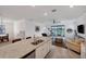Spacious kitchen with granite island and stainless steel appliances at 24273 Spartina Dr, Venice, FL 34293
