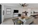 Open concept living room, kitchen, and dining area at 24273 Spartina Dr, Venice, FL 34293