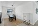 Elegant dining room with a statement chandelier at 24273 Spartina Dr, Venice, FL 34293