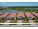 Aerial view of houses near a lake at 24273 Spartina Dr, Venice, FL 34293