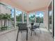 Sunroom with sliding glass doors and ample natural light at 1403 Gondola Park Dr # 1403Bd, Venice, FL 34292