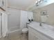Bathroom with shower/tub combo, toilet and white vanity at 1403 Gondola Park Dr # 1403Bd, Venice, FL 34292