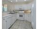 Clean white kitchen with modern appliances at 1403 Gondola Park Dr # 1403Bd, Venice, FL 34292