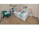 Main bedroom with king-size bed and access to balcony at 1403 Gondola Park Dr # 1403Bd, Venice, FL 34292