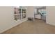 Common area with view to the living room and outside at 1403 Gondola Park Dr # 1403Bd, Venice, FL 34292