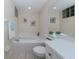 Clean bathroom with a large bathtub and updated vanity at 1403 Gondola Park Dr # 1403Bd, Venice, FL 34292