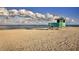 Scenic view of a beach with a lifeguard stand and ocean at 1403 Gondola Park Dr # 1403Bd, Venice, FL 34292