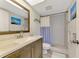 Bathroom with shower, vanity, and updated fixtures at 725 Capri Isles Blvd # 217C, Venice, FL 34292