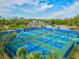 Expansive pickleball courts with many players at 12472 Davie Ct, Venice, FL 34293