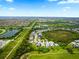 Aerial view of community near golf course at 229 Fareham Dr, Venice, FL 34293