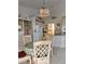 Bright dining area with a round table and four chairs at 5650 Mashie Cir, North Port, FL 34287