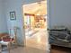 View of living room and dining area with tile floors at 5650 Mashie Cir, North Port, FL 34287