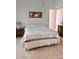 Spacious bedroom with a double bed and carpet flooring at 5650 Mashie Cir, North Port, FL 34287