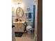 Clean bathroom with a new vanity and tiled shower at 5650 Mashie Cir, North Port, FL 34287