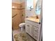 Updated bathroom features a walk-in shower, new vanity, and updated fixtures at 5650 Mashie Cir, North Port, FL 34287
