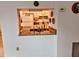 Bright kitchen features granite countertops and white cabinetry at 5650 Mashie Cir, North Port, FL 34287