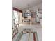 Dining area with table and chairs, near the kitchen at 5650 Mashie Cir, North Port, FL 34287