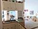Kitchen with granite countertops and view into living room at 5650 Mashie Cir, North Port, FL 34287