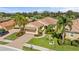 Single-Gathering home with manicured lawn and palm trees at 110 Palazzo Ct, North Venice, FL 34275