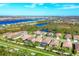 Aerial view of houses and neighborhood at 256 Benedetto Ct, Nokomis, FL 34275