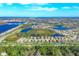 Aerial view of Milano community in Venice, Florida, showcasing the neighborhood's layout and landscape at 256 Benedetto Ct, Nokomis, FL 34275