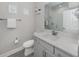 Modern bathroom with gray vanity and walk-in shower at 12586 Oak Hill Way, Parrish, FL 34219