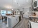 Modern kitchen with stainless steel appliances and an island at 12586 Oak Hill Way, Parrish, FL 34219