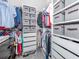Spacious walk-in closet with ample storage shelving and drawers at 12586 Oak Hill Way, Parrish, FL 34219