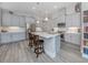 Modern kitchen with gray cabinets and an island at 12586 Oak Hill Way, Parrish, FL 34219