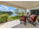 Relaxing patio overlooking a serene lake view at 12586 Oak Hill Way, Parrish, FL 34219