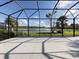 Screened lanai with view of lake and golf course at 126 Cipriani Way, North Venice, FL 34275