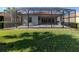 Spacious screened patio with grassy backyard at 126 Cipriani Way, North Venice, FL 34275