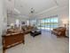 Spacious living area with access to pool and patio at 126 Cipriani Way, North Venice, FL 34275