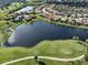 House by the lake and golf course at 126 Cipriani Way, North Venice, FL 34275