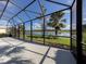 Screened lanai overlooking the lake and golf course at 126 Cipriani Way, North Venice, FL 34275