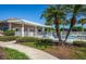 Community pool with adjacent building and landscaping at 4195 Fairway Pl, North Port, FL 34287